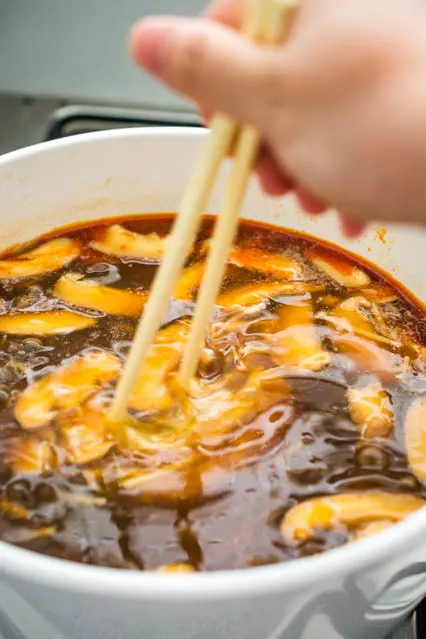 swirling eggs in hot and sour soup