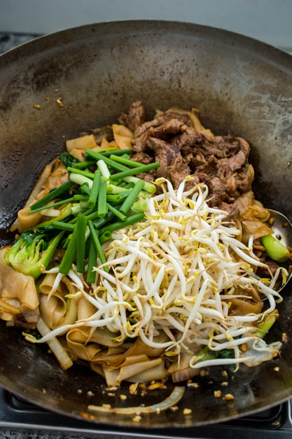 beef chow fun in a wok