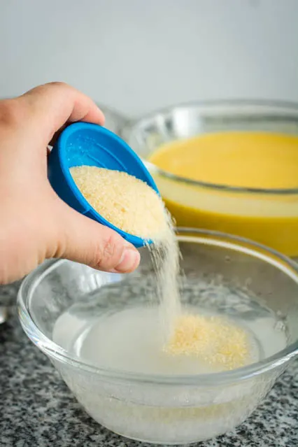 pouring gelatin for chinese mango pudding