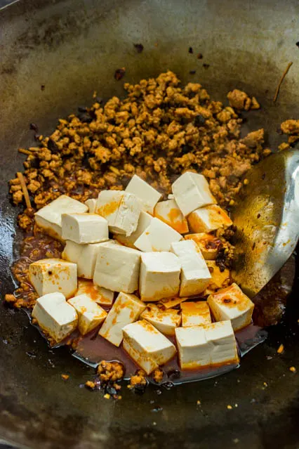 tofu cubes in wok for mapo tofu