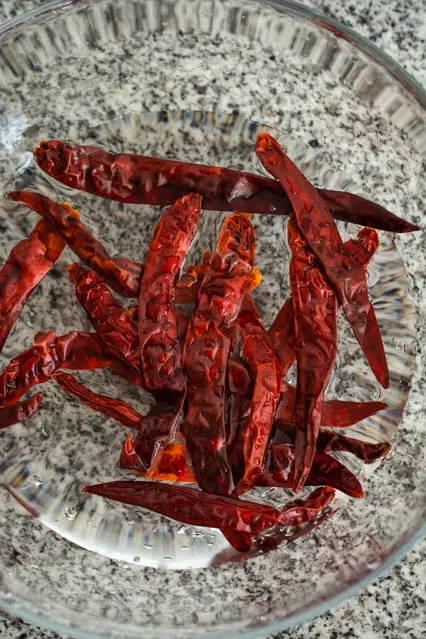 soaking dried red chilies