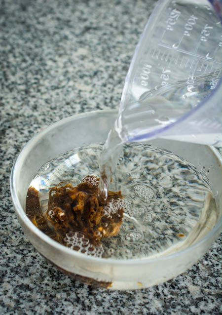 soaking tamarind paste in warm water