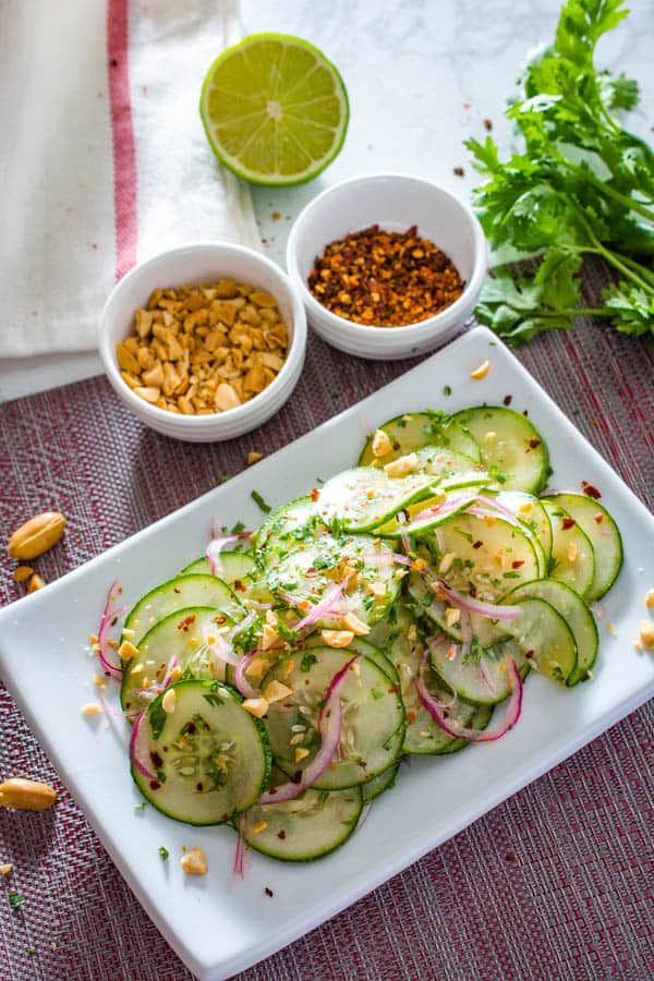 thai cucumber salad on a square plate