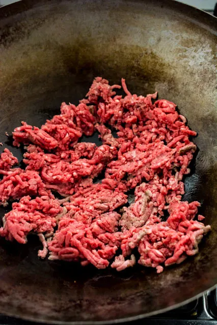 ground beef in a wok for Korean Beef Bowls