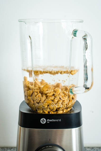 peanuts and sesame seeds in a blender with water