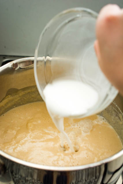 pouring rice flour mixture into chinese sweet peanut cream (fah sang wu)