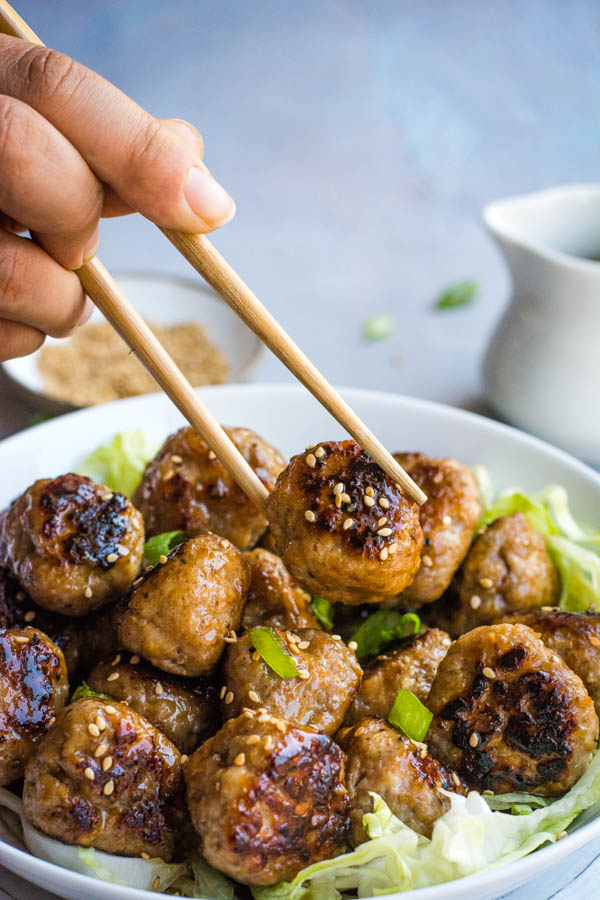 Chinese BBQ meatballs on chopsticks