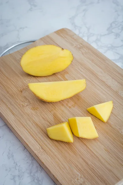 cut yellow potatoes on cutting board