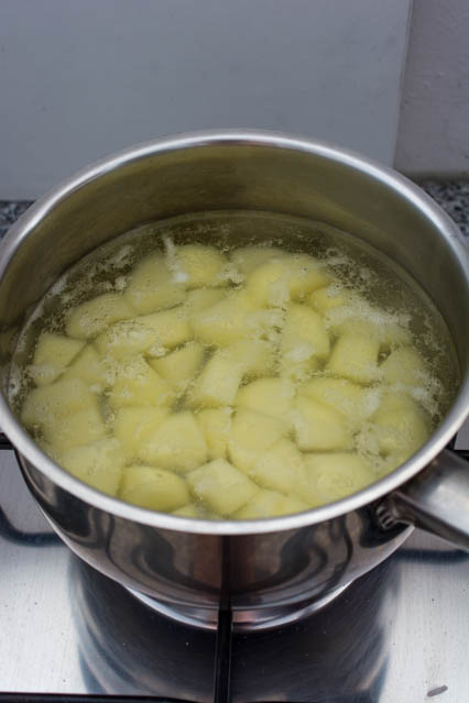 potato cubes in water on stovetop
