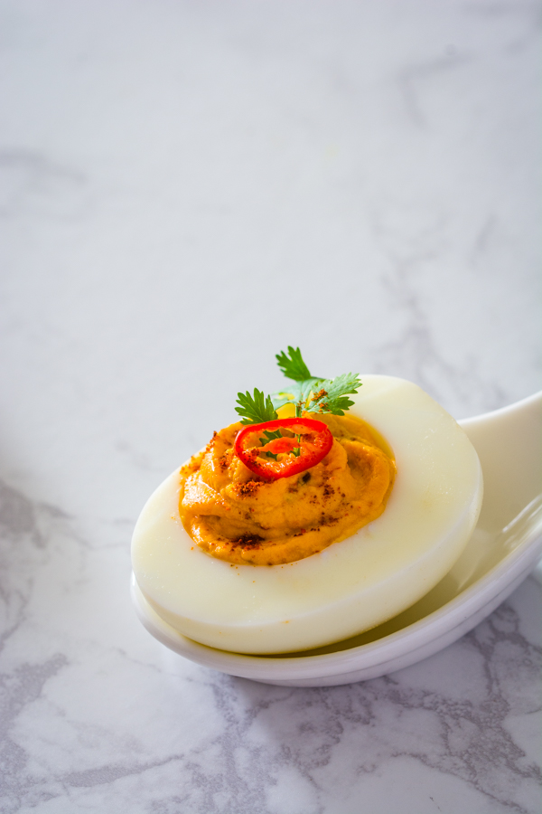 Thai Red Curry Deviled Egg on spoon