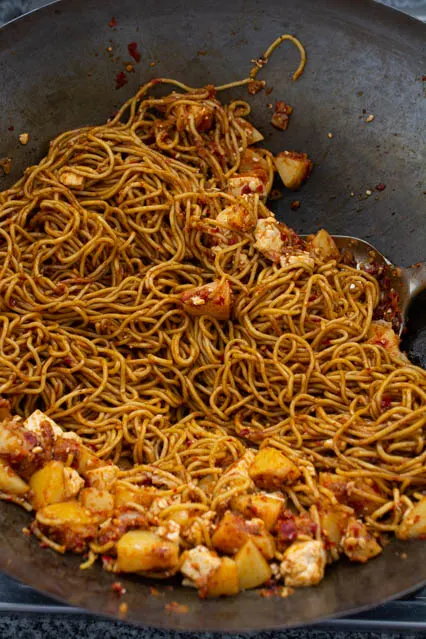 friend noodles in a wok