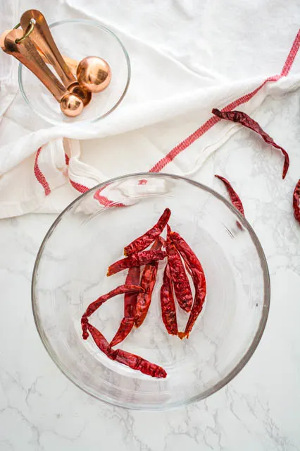 soaking dried red chilies