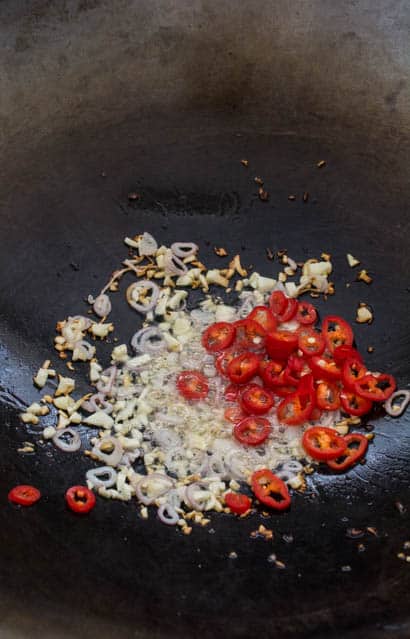 garlic, shallots and fresh chili in a wok