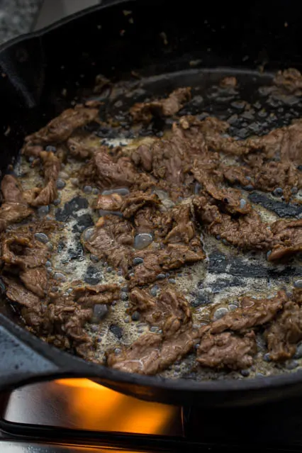 searing beef in skillet