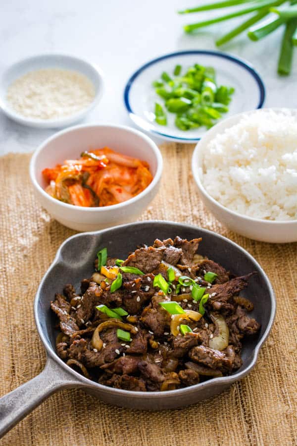 Beef Bulgogi is a famous Korean BBQ dish featuring super-thin strips of swe...