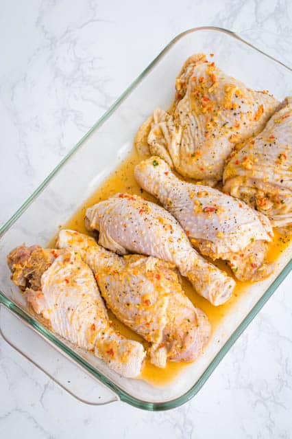 marinated chicken in baking dish