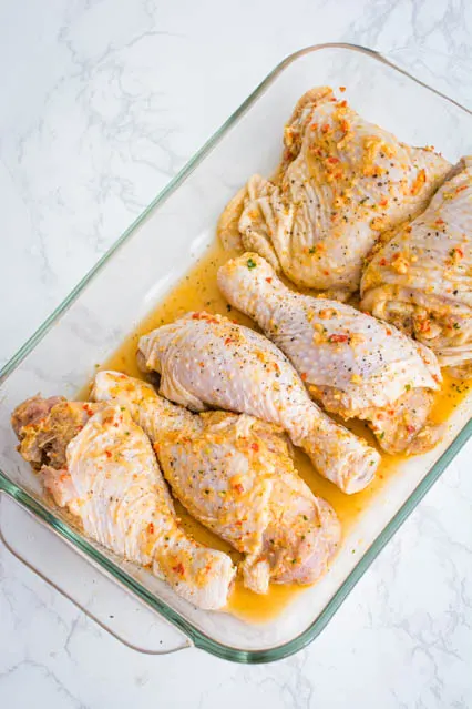 marinated chicken in baking dish