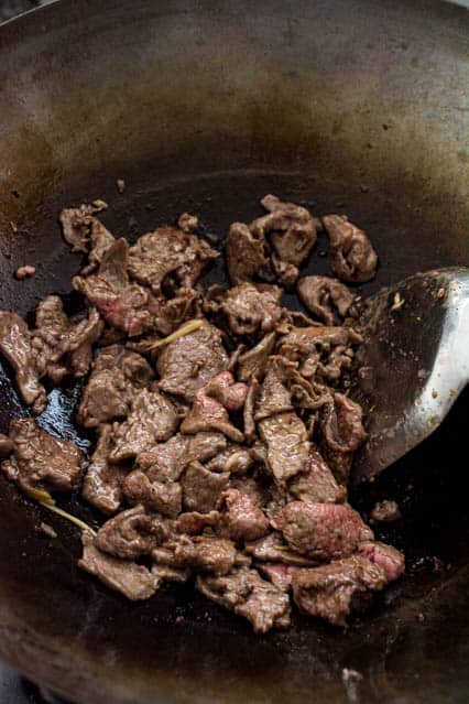 beef slices in a wok