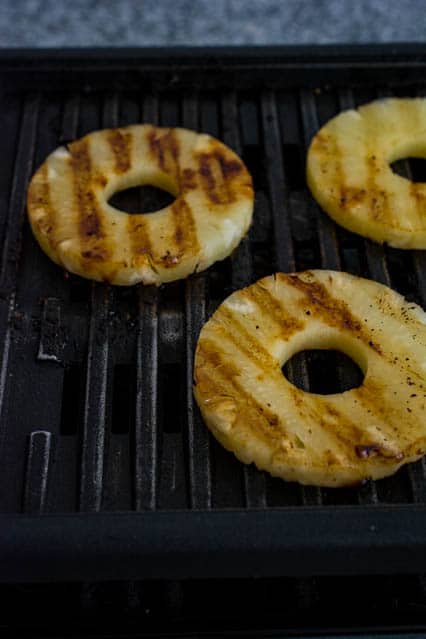 sliced pineapple on grill