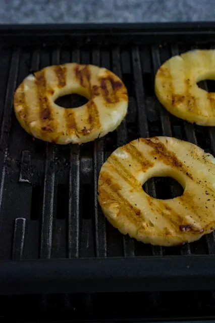 sliced pineapple on grill