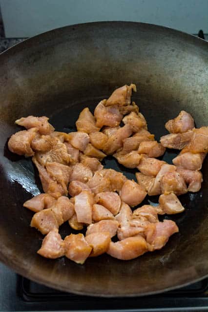 marinated chicken in a wok