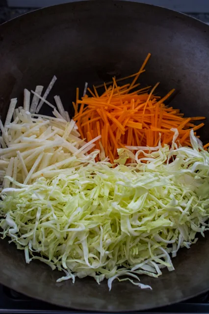 vegetables for spring rolls in wok