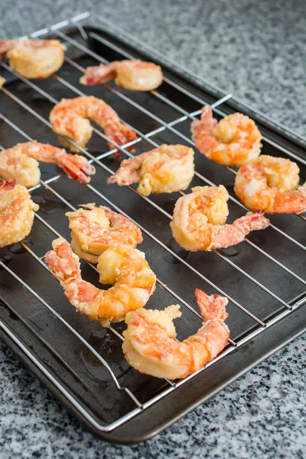 fried shrimp on cooling rack