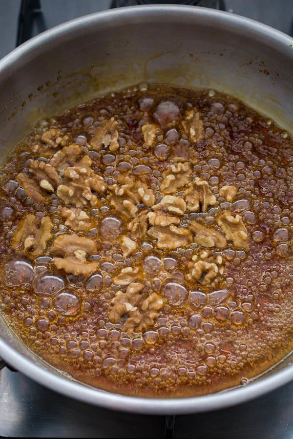 candied walnuts in saucepan