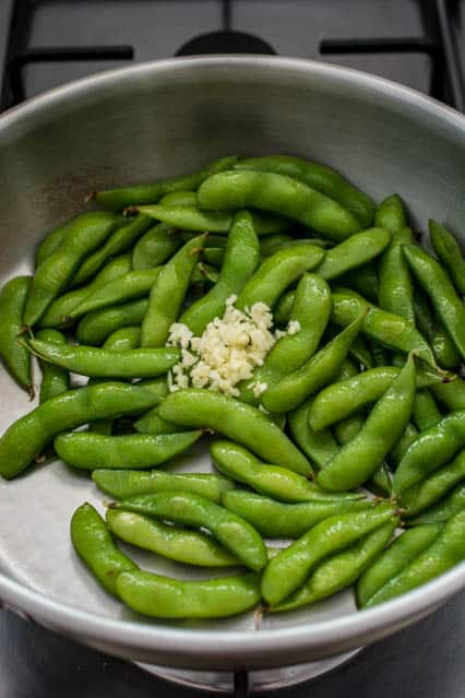 edamame pods with minced garlic