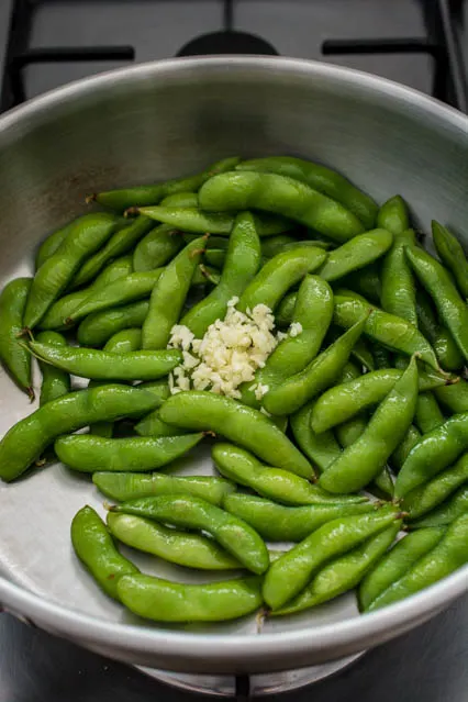 edamame pods with minced garlic