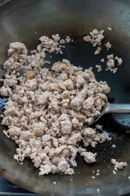 stir fried ground pork in wok