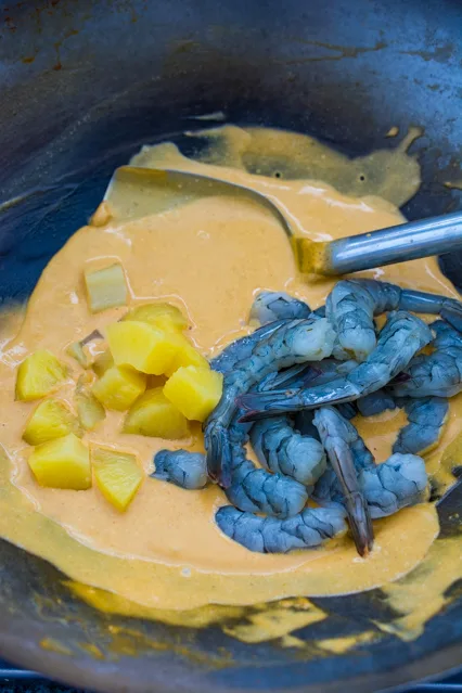 red curry with pineapple and raw shrimp