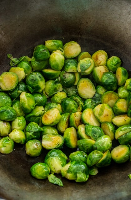 caramelized brussels sprouts in a wok