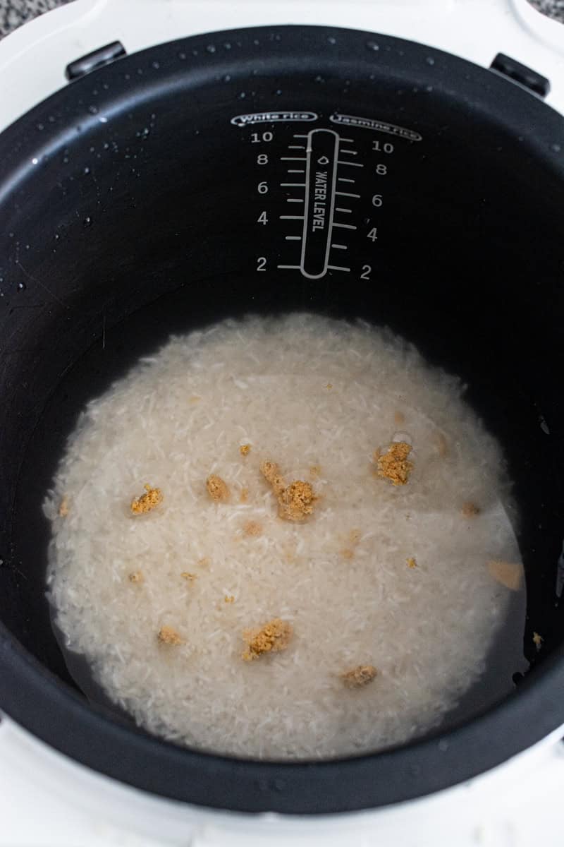 adding chicken bouillon to rice cooker