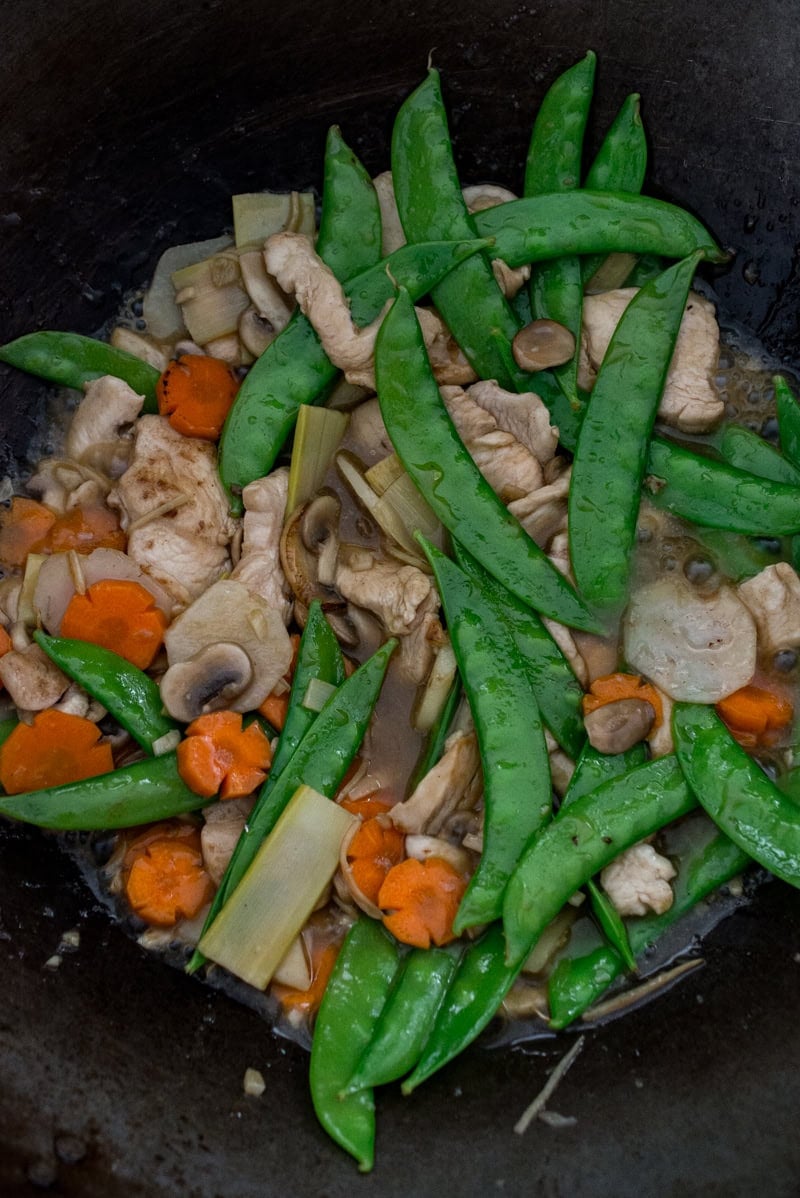 moo goo gai pan ingredients in a wok
