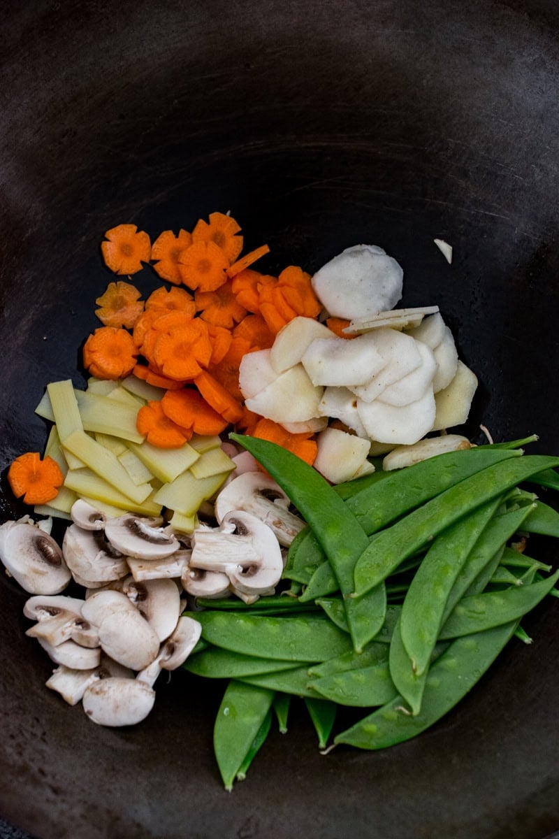 stir frying vegetables for moo goo gai pan