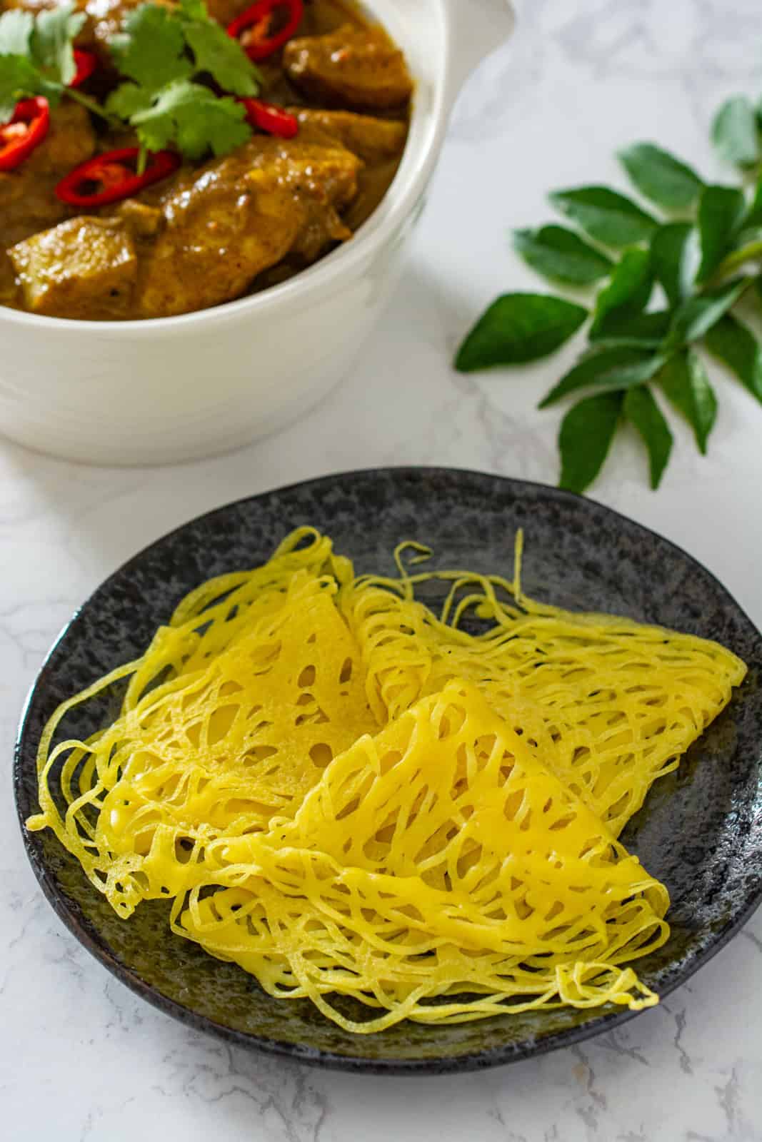 roti jala triangles with curry