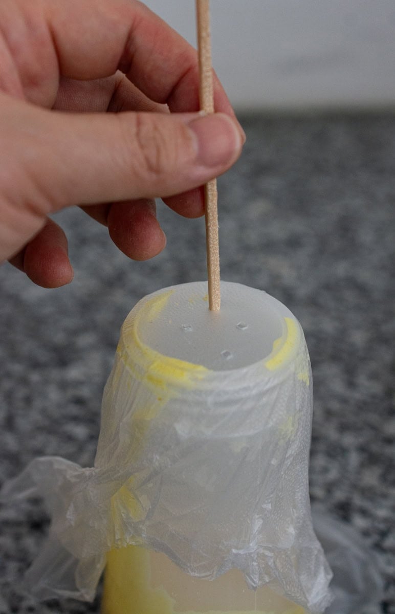 poking holes in press n seal for DIY roti jala tool