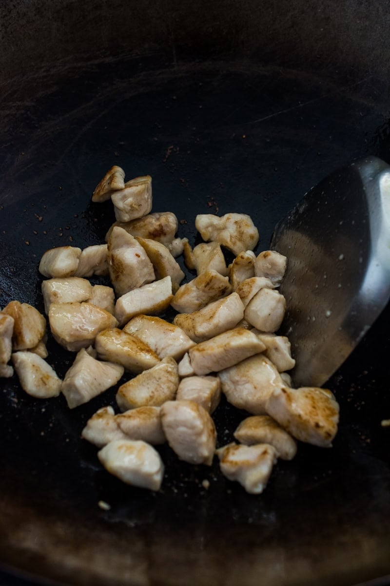 cooked chicken in a wok for stir fry